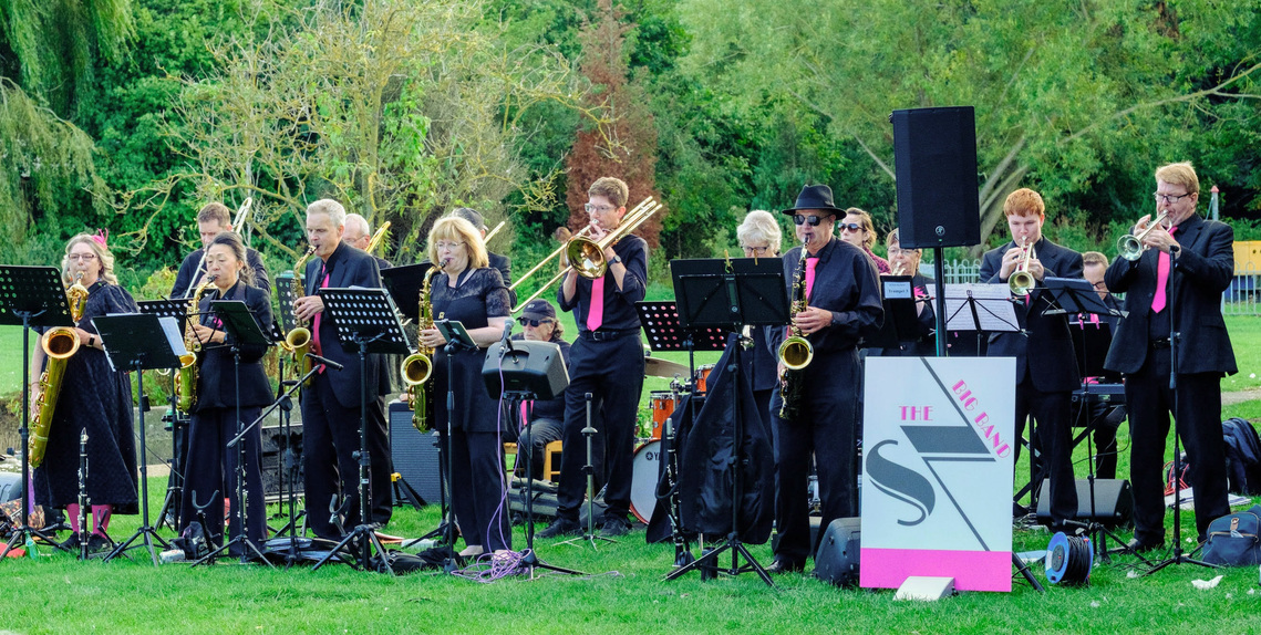 Big band performing live in an outdoor location