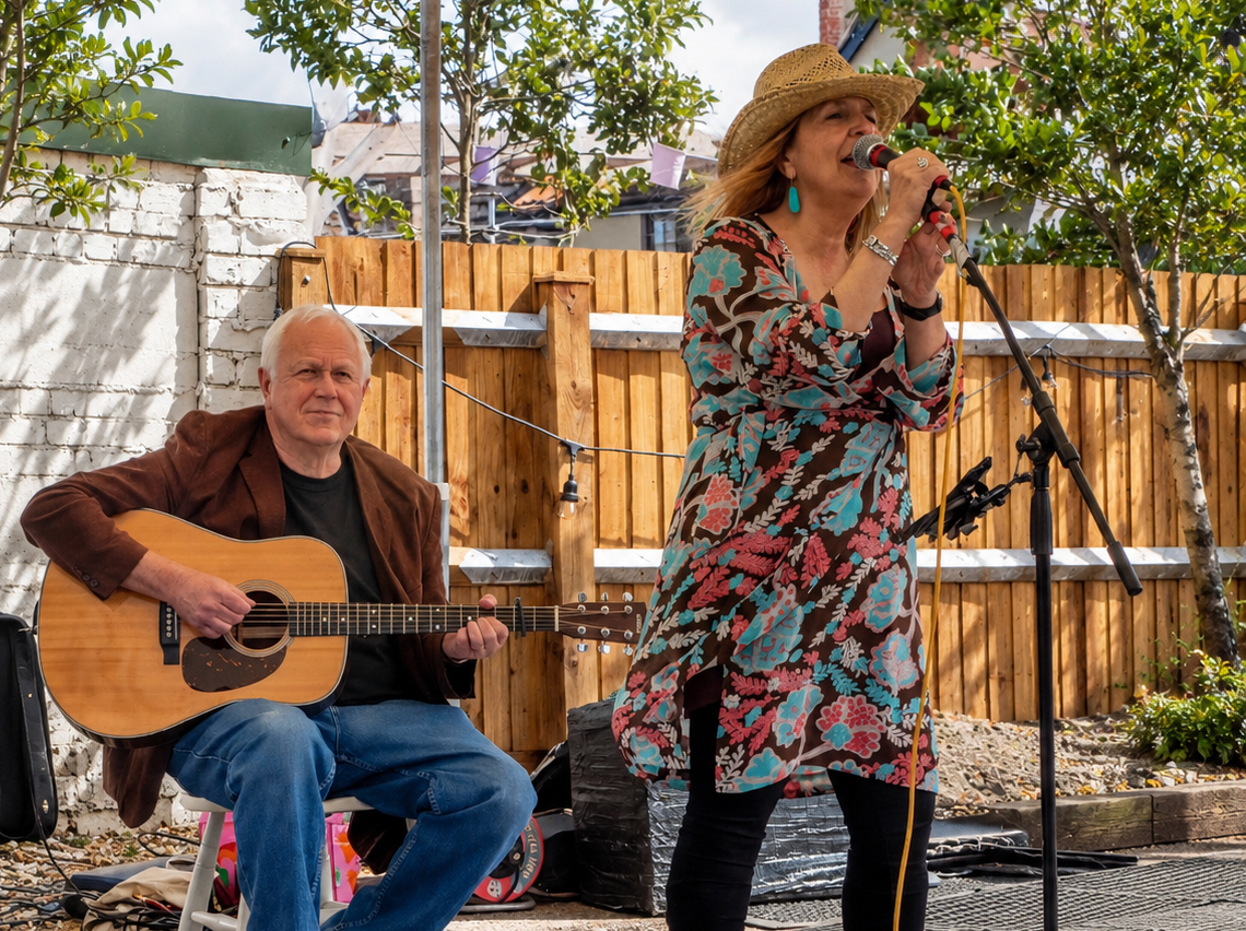 Ten Cent Town duo performing outside